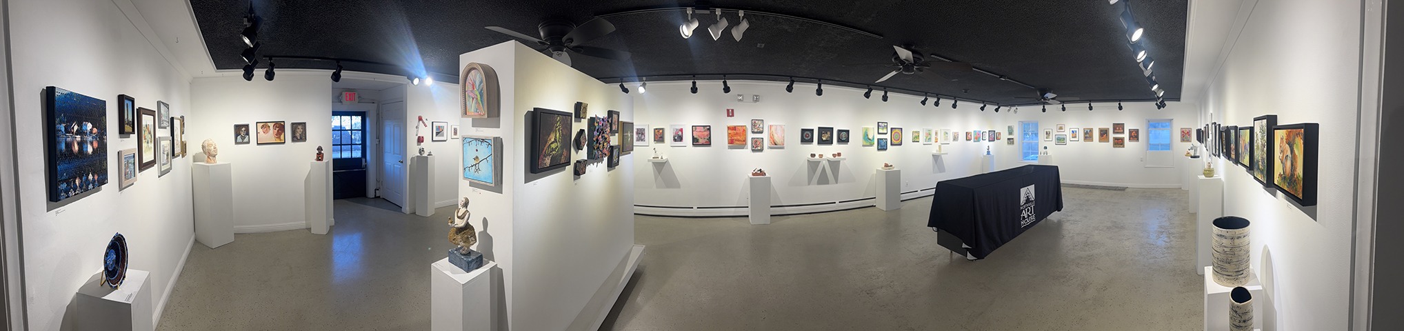 A close-up view of small-scale artwork, illustrating the intimate nature of holiday-size pieces.